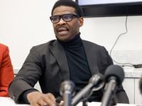 Michael Irvin speaks at a press conference at the Regency Plaza in Dallas on Tuesday, March...