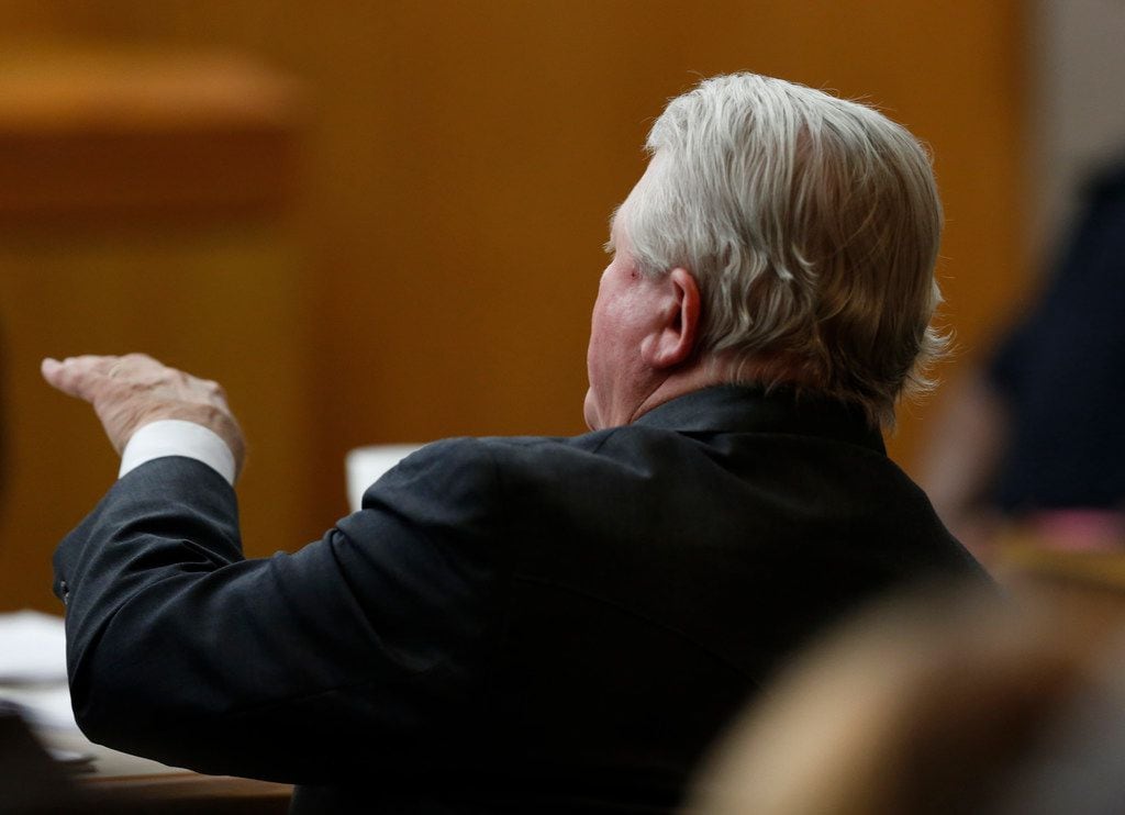 Defense attorney Jim Lane questions Roy Oliver, who is charged with the murder of...