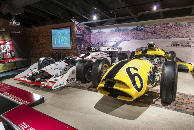 Newer and older Indy cars sit on display in the Unser Racing Museum in Albuquerque.  The...