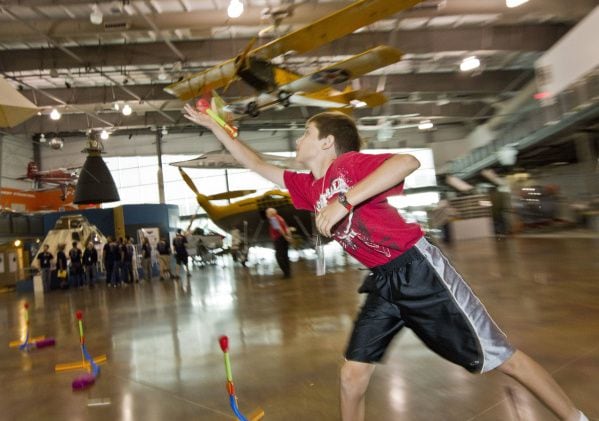 Zack Shawver catches an air rocket during a summer flight school at the Frontiers of Flight...