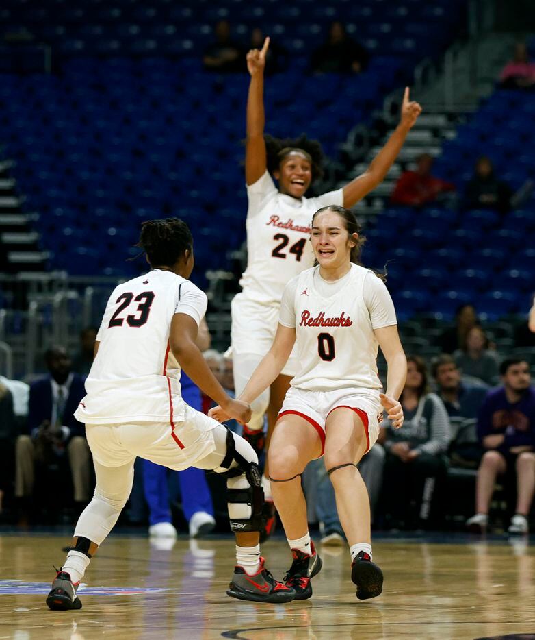 Frisco Liberty Jezelle Jolie Moreno (0) begins to celebrate with Journee Harris (23) as time...