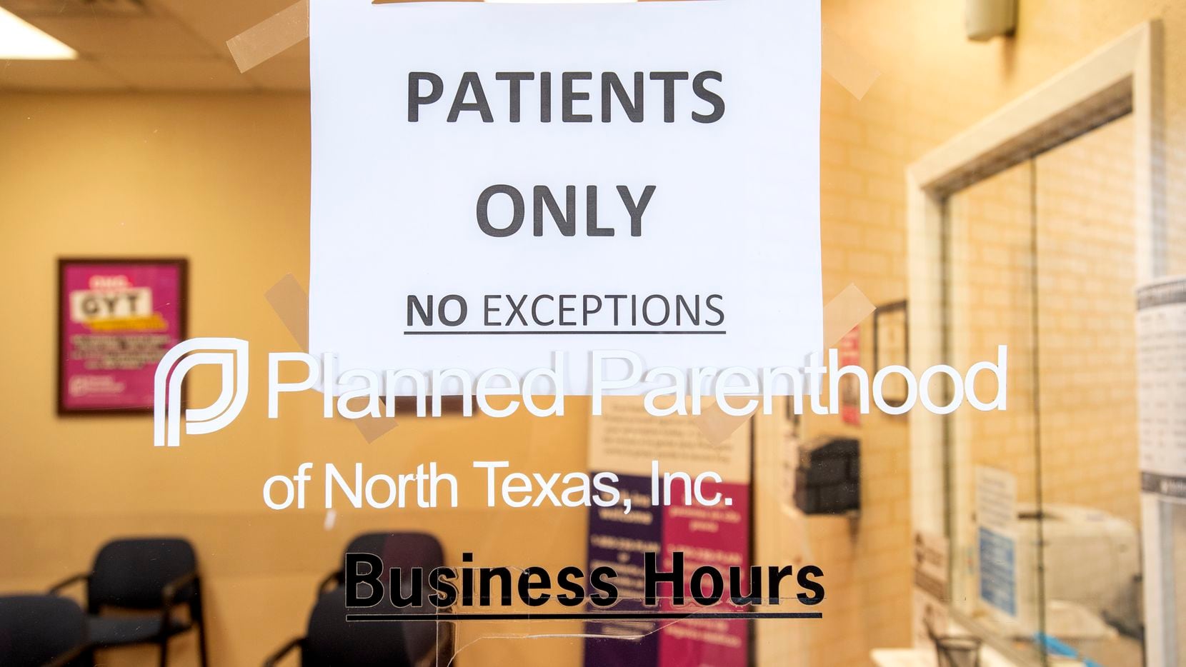 A sign on the door of Planned Parenthood prohibits entry by  everyone but patients to limit the spread of COVID-19 on Tuesday, March 31, 2020 in Dallas. Texas Attorney General Ken Paxton says the state has won an appeal to enforce its temporary abortion ban while the state litigates a lawsuit from abortion providers, including Planned Parenthood.