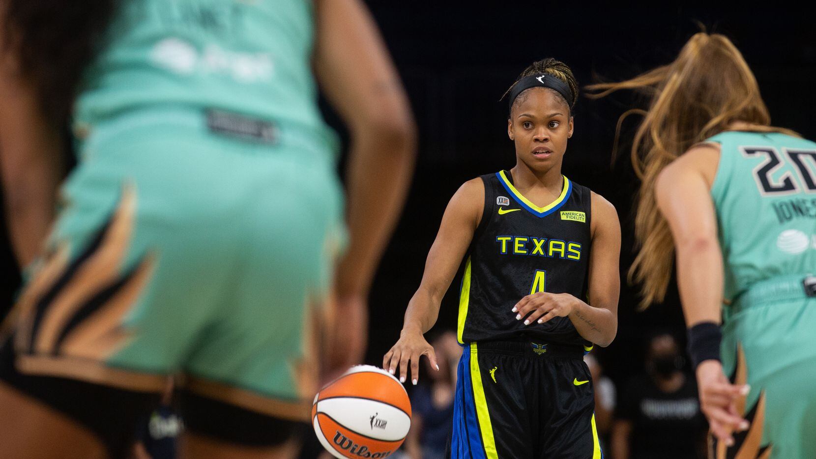 Dallas Wings guard Moriah Jefferson (4) looks for the next play during their game against...