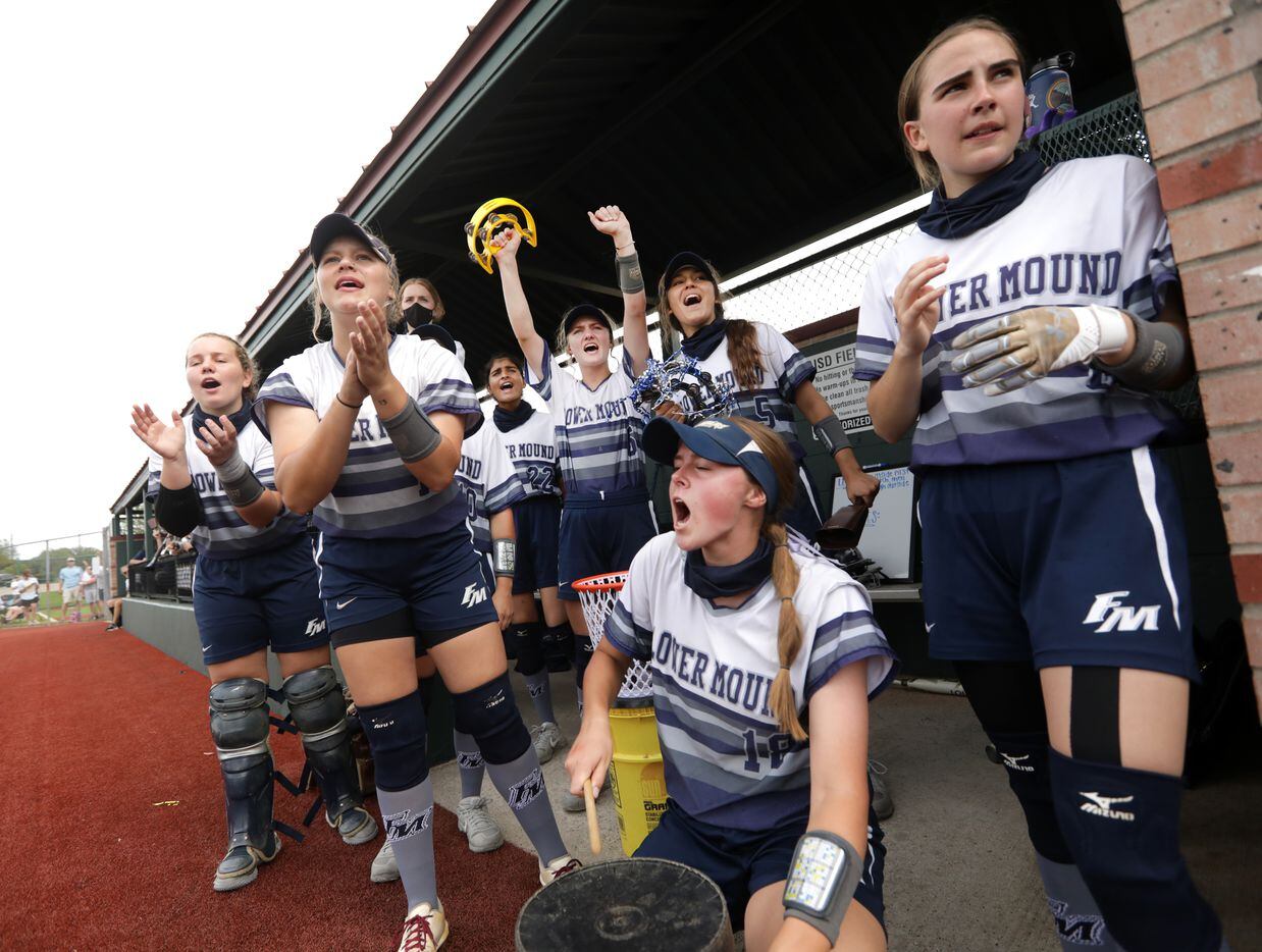 Flower Mound High School players cheer during a softball playoff game against Allen High...