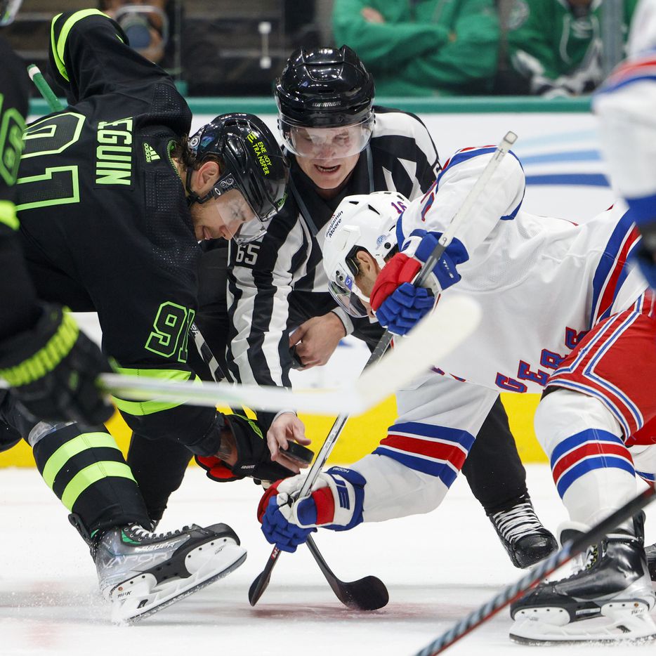 Dallas Stars center Tyler Seguin (91) faces-off with New York Rangers center Vincent...