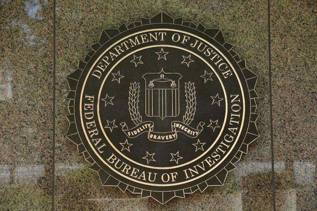  This file photo taken on July 05, 2016 shows the FBI seal outside the headquarters building...