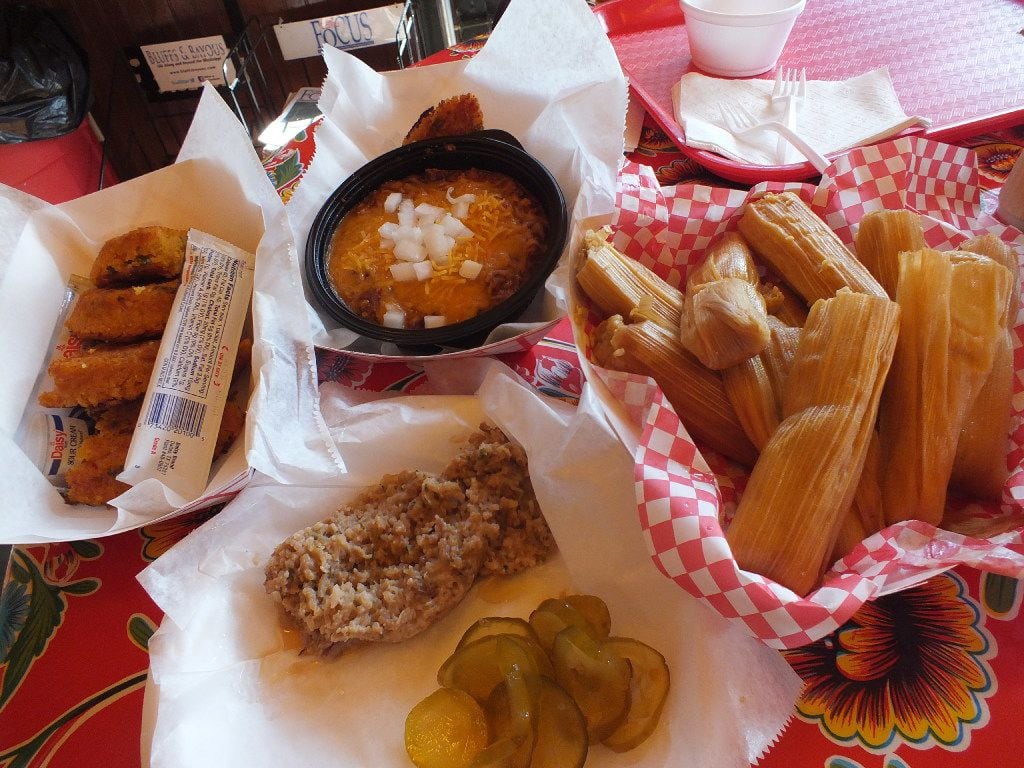 At Fat Mama s in Natchez, people who ve yet to try the local  cuisine are encouraged to try a variety of menu items,  including tamales, a southern-style sausage, chili and cornbread.