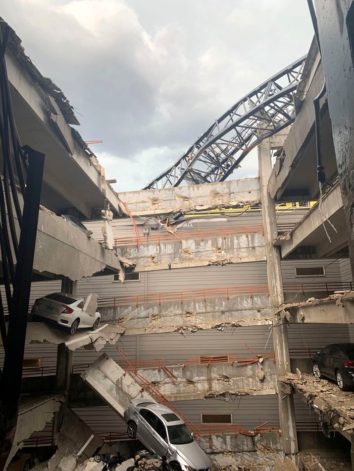 Injuries were reported after a crane fell into the Elan City Lights apartment building and parking garage in Old East Dallas close to downtown, as a severe storm passed through Dallas on Sunday afternoon, June 9, 2019.