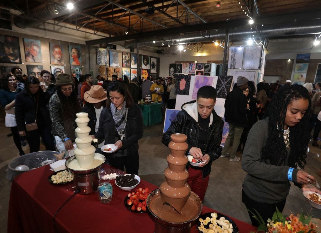 Guests take in the sights, sounds and flavors of the Chocolate and Art Show at Lofty Spaces...