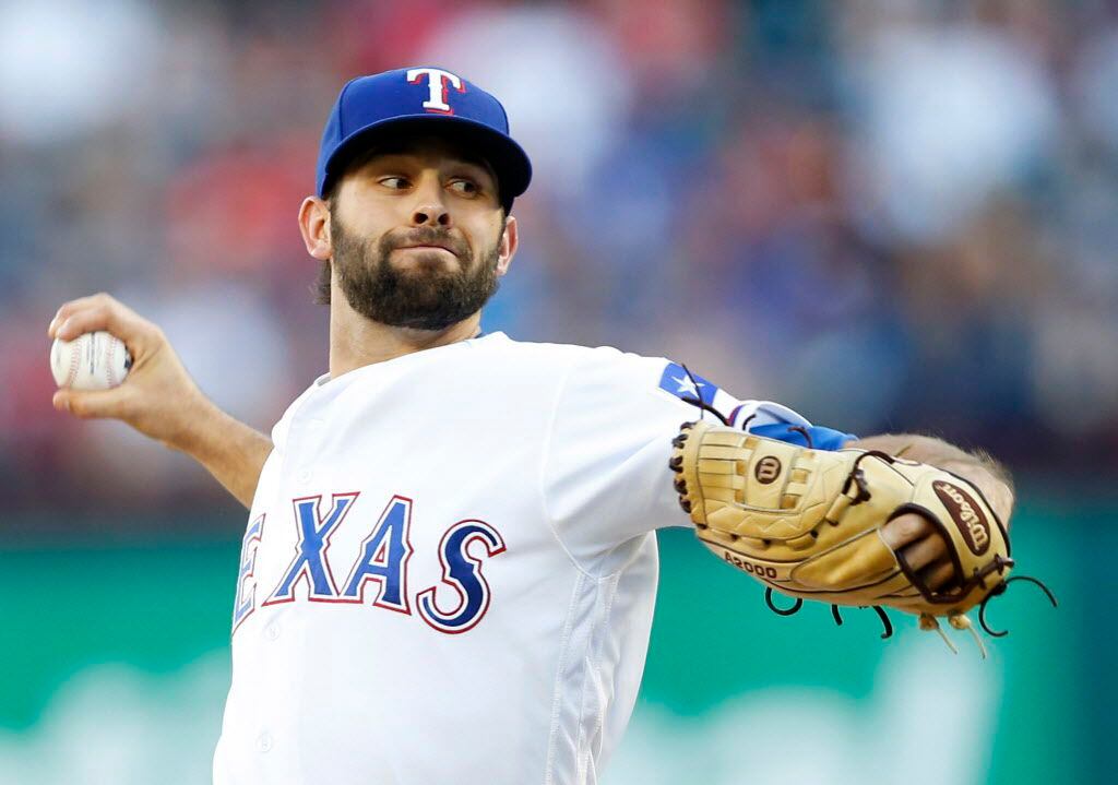 Texas Rangers starting pitcher Nick Martinez (22) pitches in a game against the Toronto Blue...
