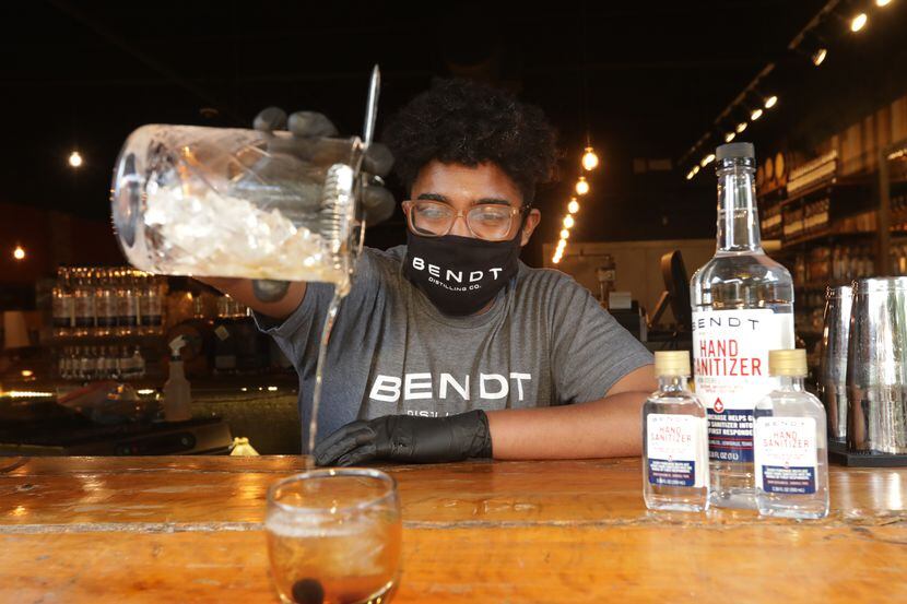 Bartender Michael Moore makes an old fashioned at Bendt Distilling in Lewisville, TX, on...