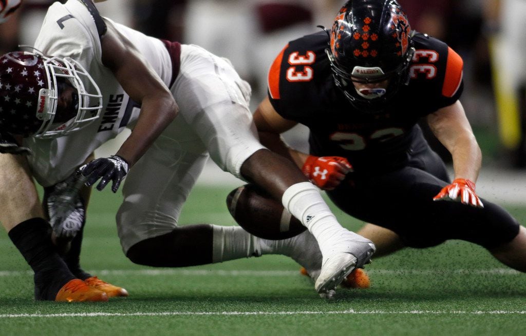 Ennis special teams player Laylon Spencer (7) fumbles a kickoff return attempt as Aledo defender Garrett Key (33) moves in during first quarter action. The two teams played their Class 5A Division ll Regional final playoff football game at Frisco Center at The Star in Frisco on December 6, 2019. (Steve Hamm/ Special Contributor)
