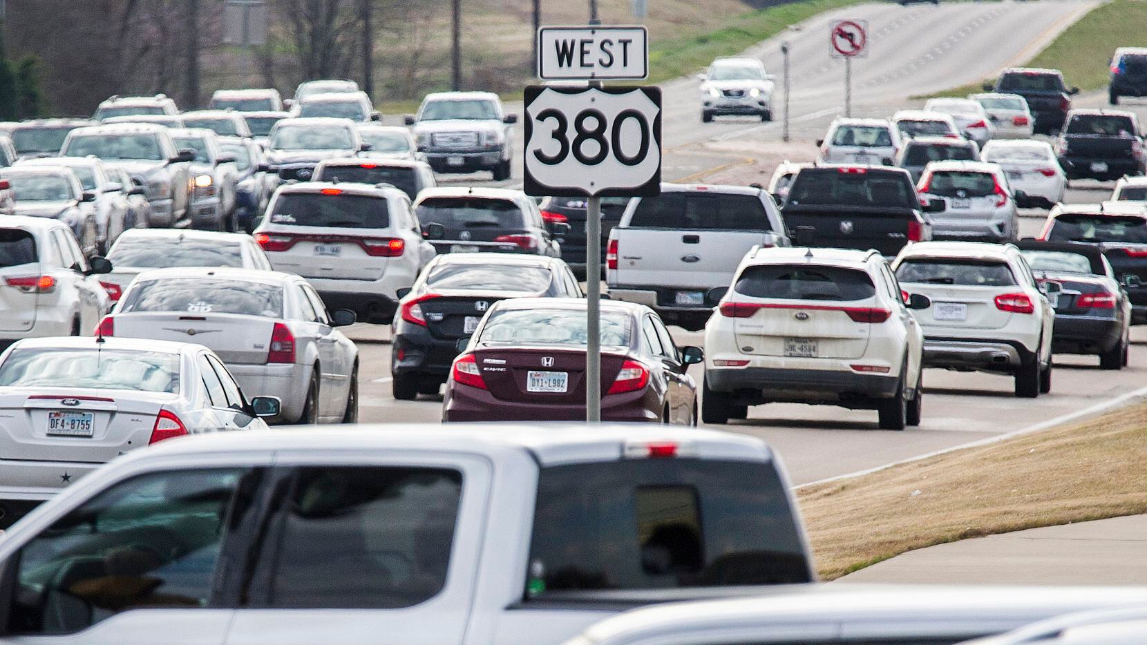 Traffic backs up at evening rush hour on U.S. Highway 380 near Lake Forest Drive in...
