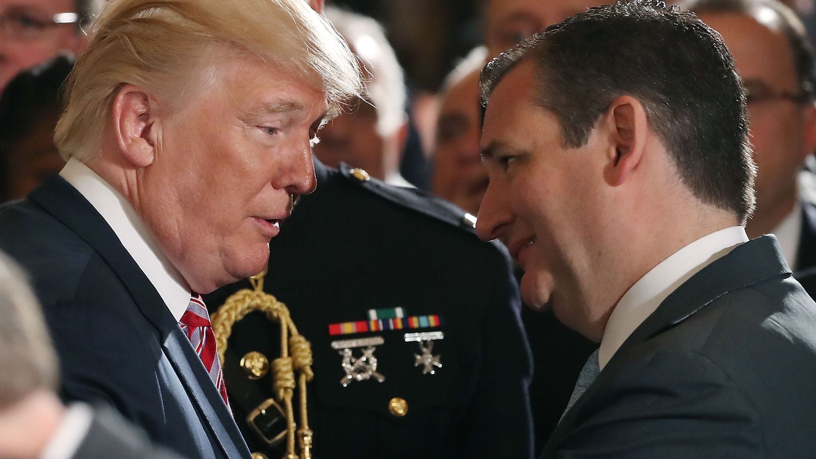 President Donald Trump and Sen. Ted Cruz speak in the East Room of the White House at an...