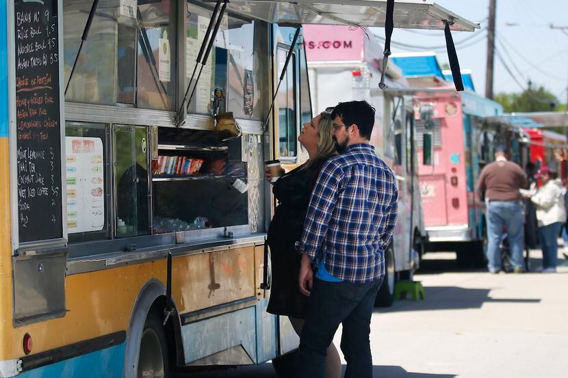 Food trucks are lined up during the Frisco StrEATS Gourmet Food, Truck and Music Festival on...