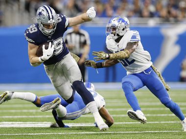 Dallas Cowboys tight end Blake Jarwin (89) runs up the field after the catch as Detroit Lions strong safety Tavon Wilson (32) attempts to tackle him during the first half of play at Ford Field in Detroit, on Sunday, November 17, 2019. (Vernon Bryant/The Dallas Morning News)
