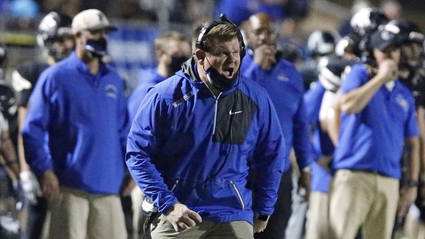 Plano West High School head coach Tyler Soukup calls out to his team during the first half as Plano West High School hosted Flower Mound Marcus High School in a District 6-6A football game at Clark Stadium in Plano on Friday night, November 13, 2020.