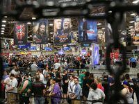Fans wait in lines during WrestleMania Axxess at the Kay Bailey Hutchison Convention Center in Dallas Thursday March 31, 2016. Axxess offers fans access to WWE stars, autographs, interactive fan experiences and NXT matches. WrestleMania 32 will take place Sunday, April 3 at AT&T Stadium in Arlington, Texas.