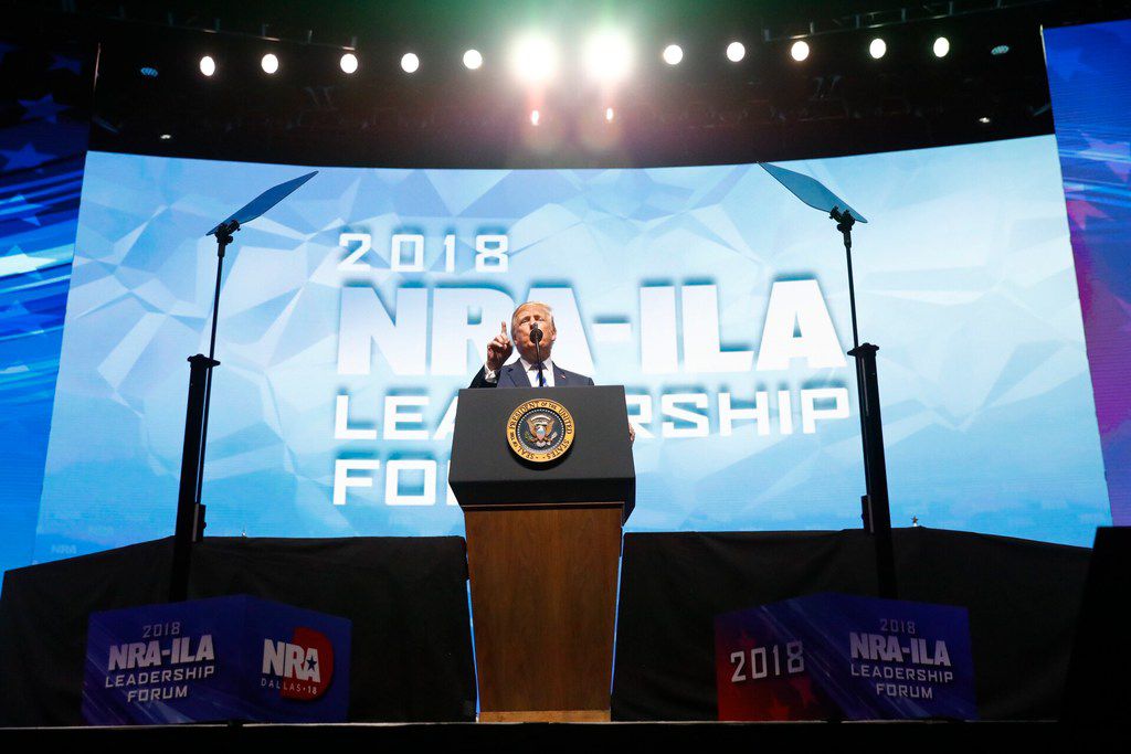President Donald Trump speaks to the crowd assembled in the Kay Bailey Hutchison Convention Center for the NRA Annual Meeting in Dallas, Friday, May 4, 2018. . This is the second year as President that Trump has spoken to the gun rights group. (Tom Fox/The Dallas Morning News)