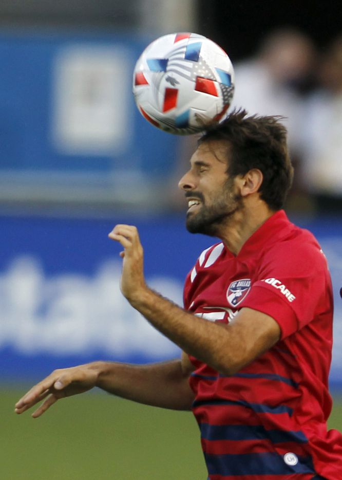 FC Dallas midfielder Facundo Quignon (5) heads the ball toward a teammate during the first...