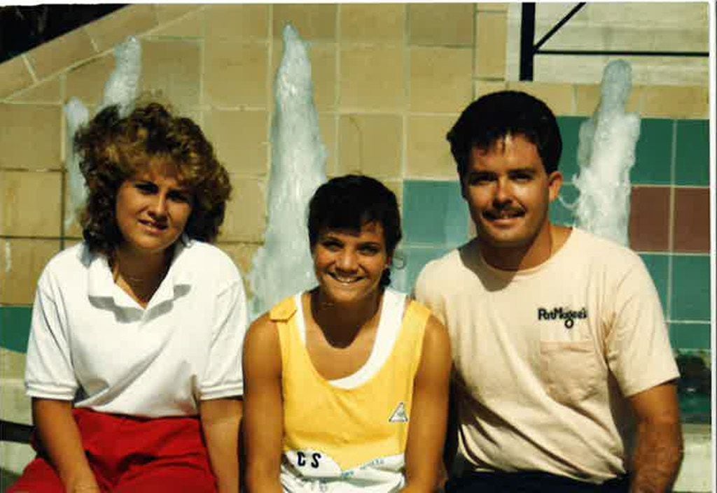 Traci Roberts and Laura Anton pose for a photograph with Tristan Longnecker during the 1986...
