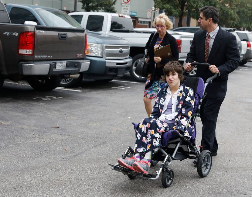 Christy and Mark Zartler take their daughter, Kara, with them to probate court in downtown...
