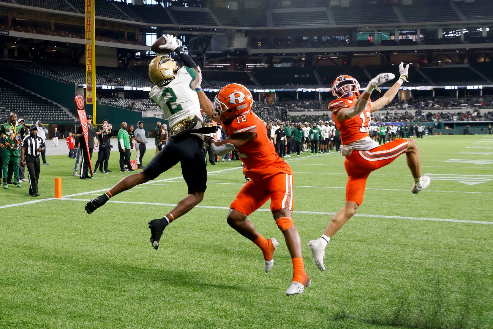 DeSoto receiver Mike Murphy makes a touchdown reception in front of Rockwall defenders Kevin Cunningham (12) and Cadien Robinson (13) during the second half of the Class 6A Division I area round high school football game in Arlington, Texas on Saturday, Sept. 20, 2021. (Michael Ainsworth/Special Contributor)
