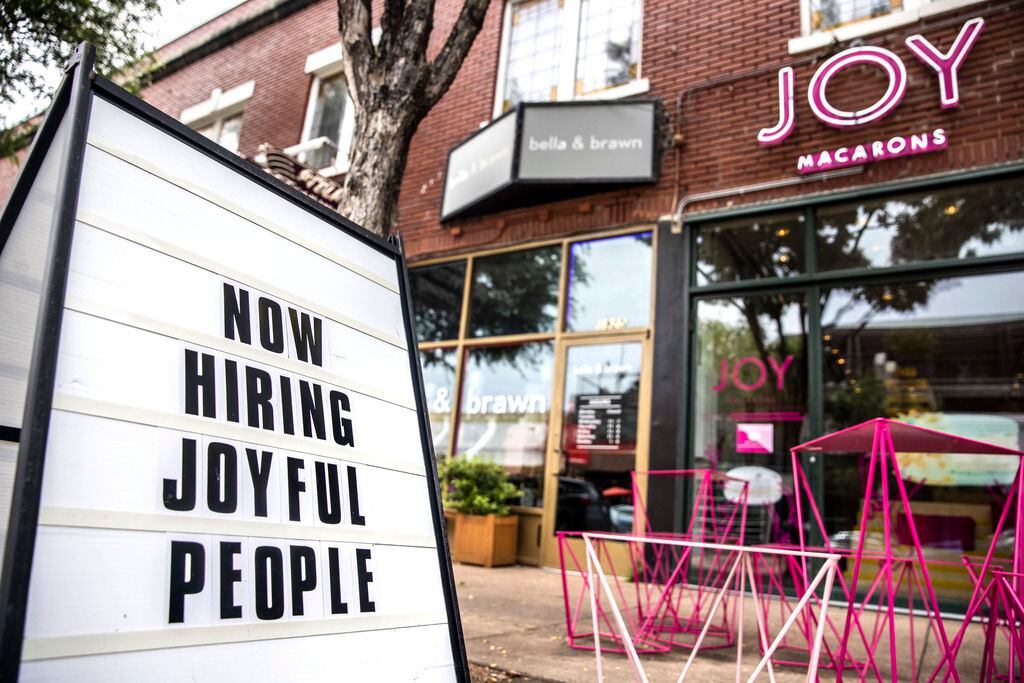 A “Now Hiring” sign outside of Joy Macarons in Dallas on Tuesday, June 8, 2021. ...