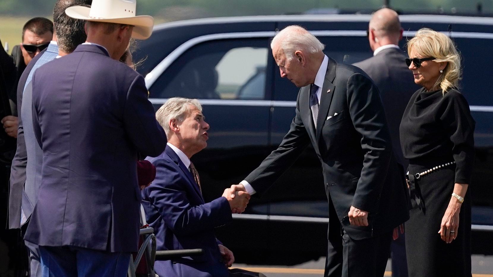 FILE - President Joe Biden and first lady Jill Biden greet Texas Gov. Greg Abbott as they...