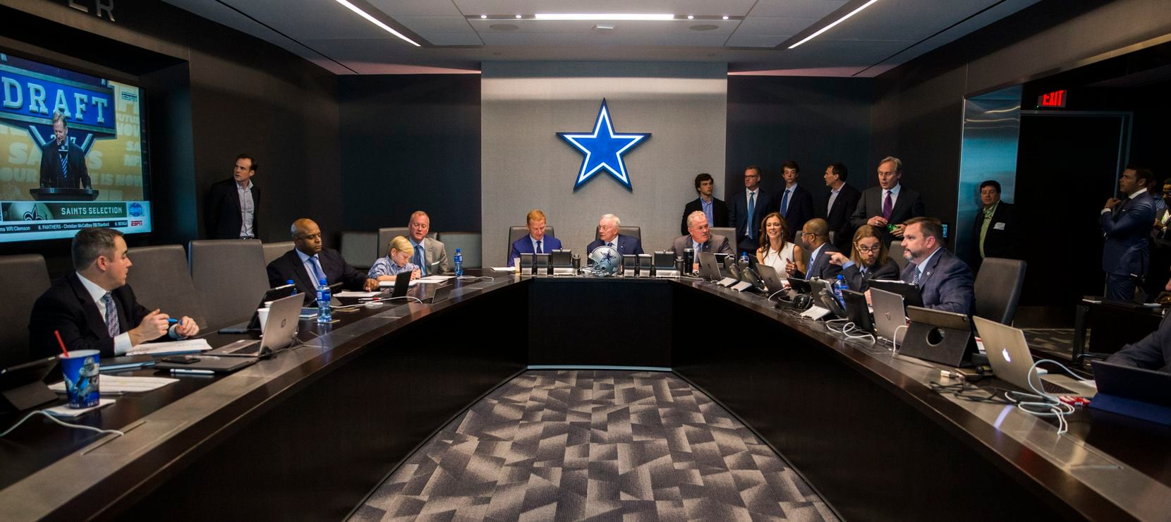 Dallas Cowboys head coach Jason Garrett, team owner Jerry Jones, executive vice president and CEO Stephen Jones, executive vice president and chief brand officer Charlotte Jones Anderson and other executives discuss players in the war room during round one of the 2017 NFL Draft on Thursday, April 27, 2017, at The Star in Frisco. 