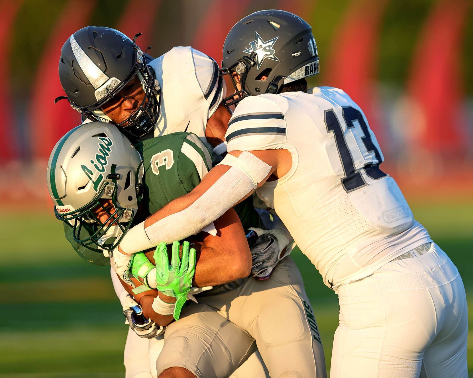 Frisco Reedy running back Dennis Moody (3) gets stuffed on the play by Frisco Lone Star...