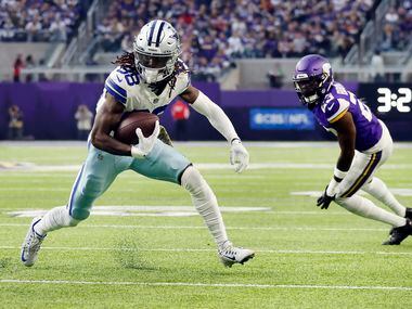 Dallas Cowboys wide receiver CeeDee Lamb (88) was nearly tripped up by Minnesota Vikings...