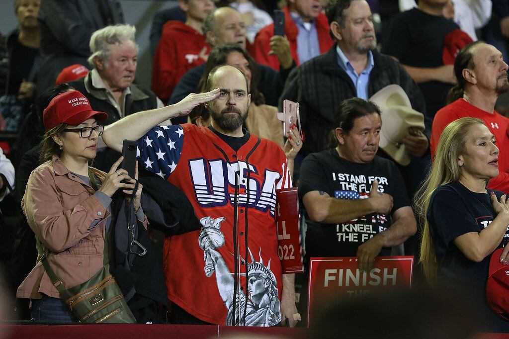 People listen to the National Anthem being played before the arrival of President Donald Trump at his rally in the El Paso County Coliseum on February 11, 2019 in El Paso, Texas. 