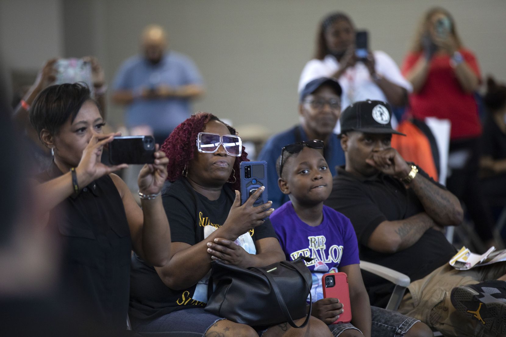 Shalonda Gilmore (center), he mother of Kealon Gilmore, attended "Enough is Enough: Stop the...