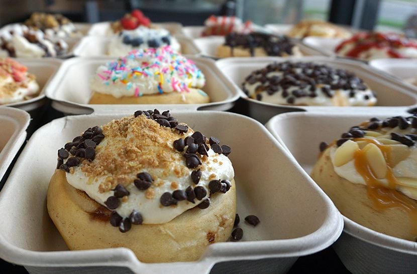 Rows of cinnamon rolls await hungry customers at a Cinnaholic location. The company plans to...