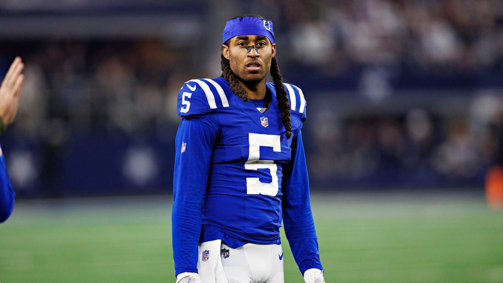 ARLINGTON, TEXAS - DECEMBER 4:  Stephon Gilmore #5 of the Indianapolis Colts looks to the...