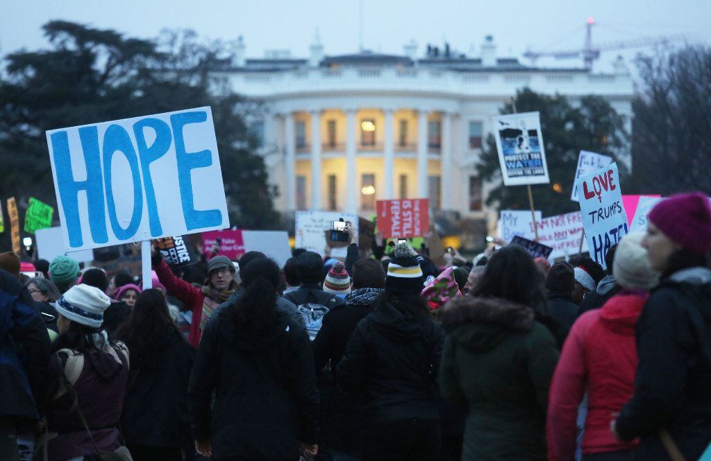Protesters gather outside the White House at the finish of the Women's March on Washington on January 21, 2017 in Washington, DC. 