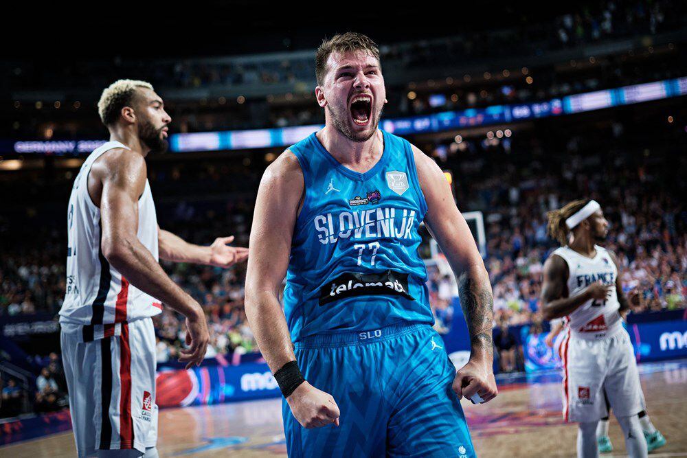 Luka Doncic celebrates in front of Rudy Gobert during Slovenia's EuroBasket win over France...