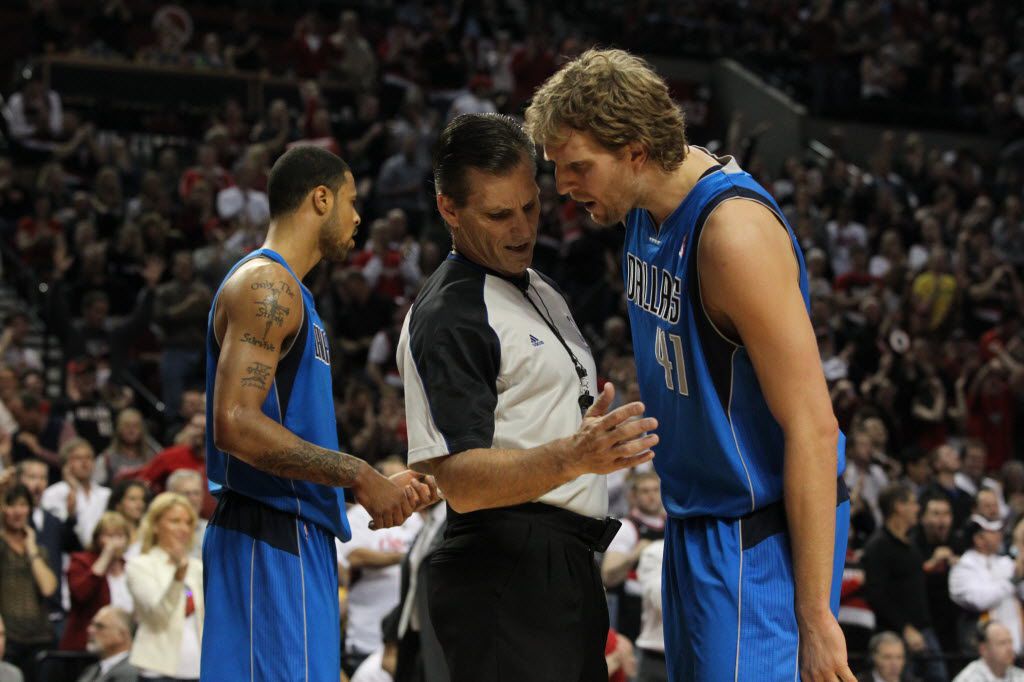 Dallas Mavericks forward Dirk Nowitzki (41) exchanges words with an official in the first period of game six of the first round of the Western Conference NBA Playoffs against the Portland Trail Blazers at the Rose Garden in Portland Oregon on April 28, 2011. (Michael Ainsworth/The Dallas Morning News)