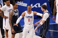 Los Angeles Clippers guard Russell Westbrook (0) gets in an exchange with Dallas Mavericks...