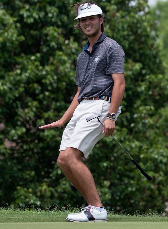 Highland Park, Christian Clark, uses body language to try and slow a putt down during the...