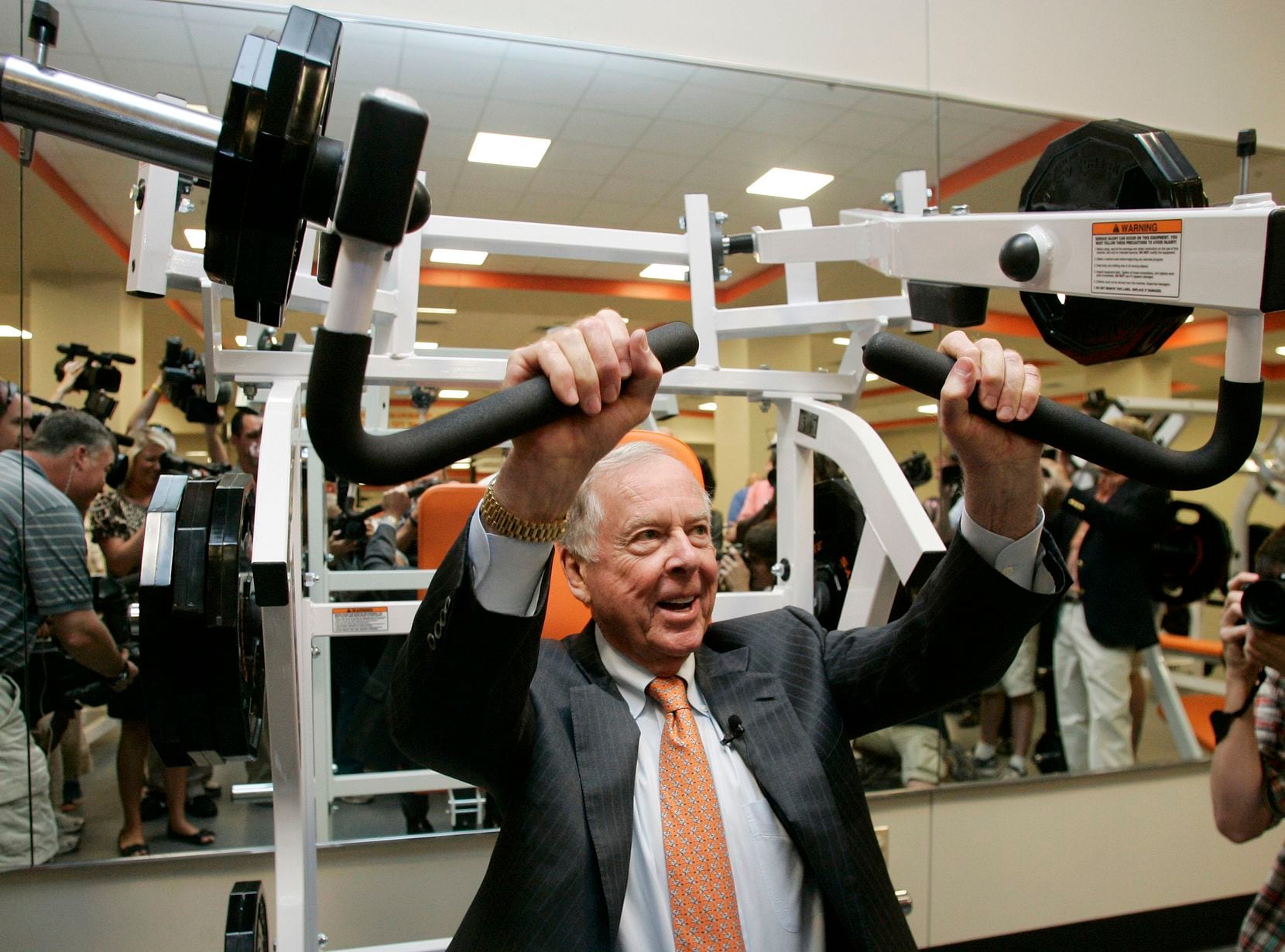 Pickens tried out a machine in the new weight room at Oklahoma State in 2009. Through a...