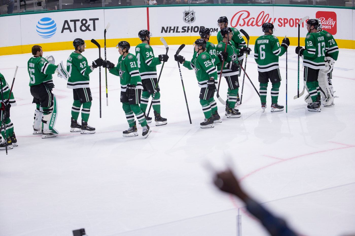 Dallas Stars players celebrate their preseason game win against St. Louis Blues on Tuesday, Oct. 5, 2021, at American Airlines Center in Dallas. (Juan Figueroa/The Dallas Morning News)