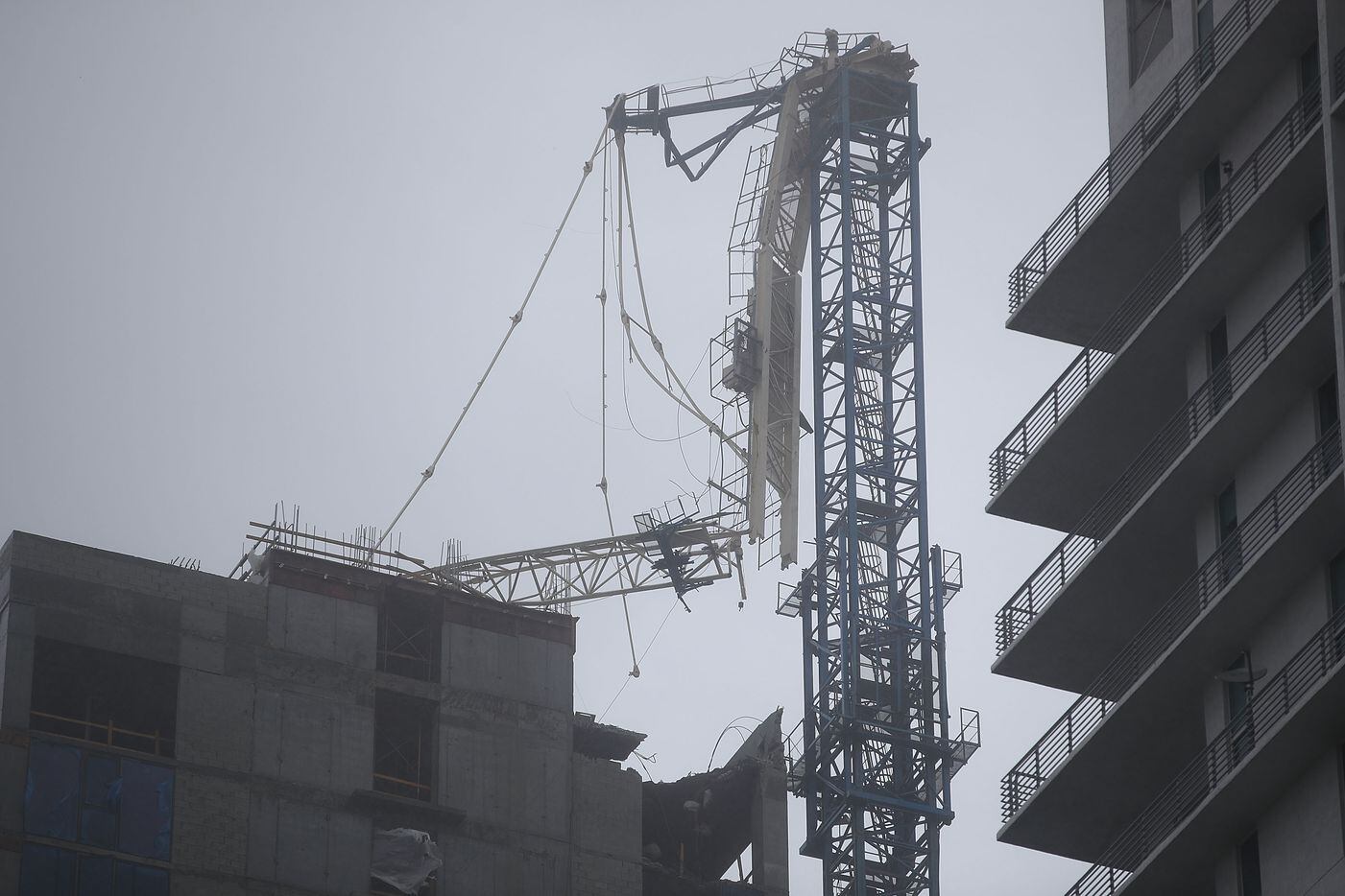 A crane tower is seen after part of it collapsed from the winds of Hurricane Irma on...