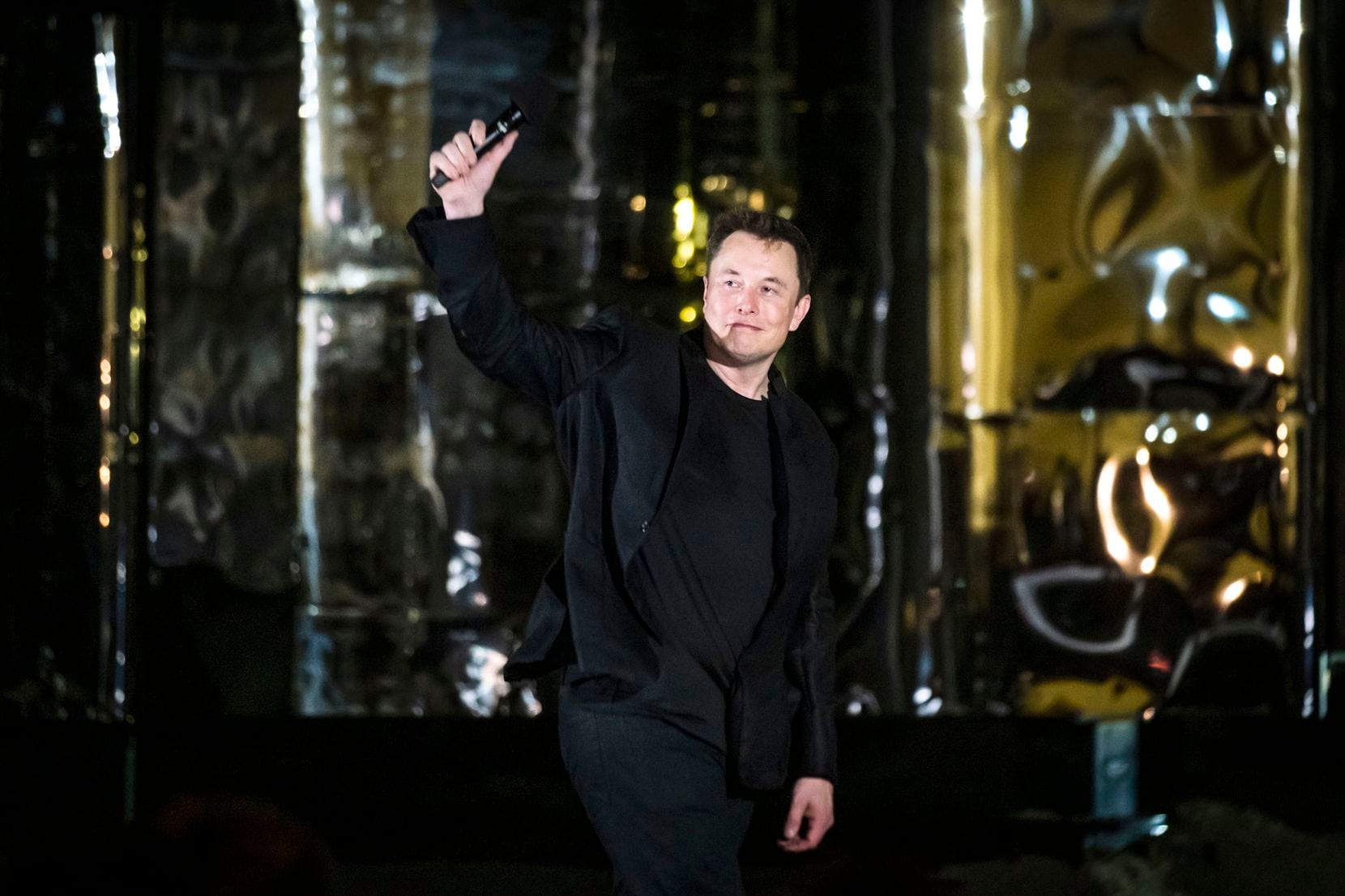 SpaceX founder Elon Musk makes a presentation in front of a prototype of the Starship...