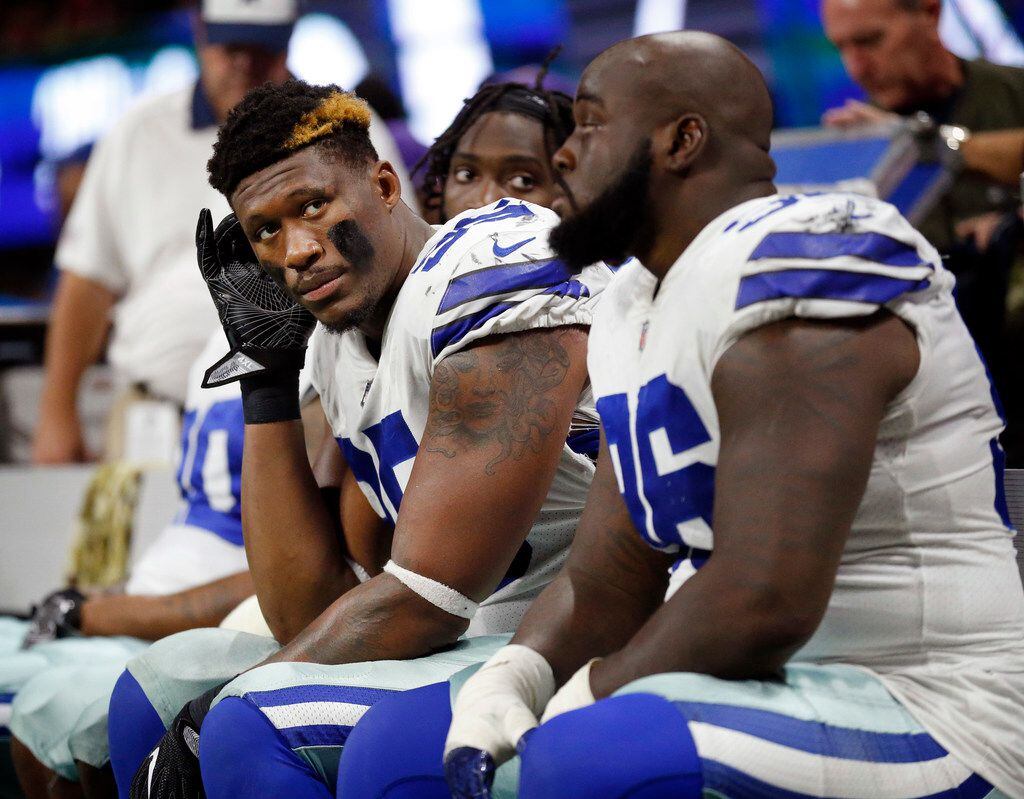 Dallas Cowboys defensive tackle David Irving (95) and the rest of the line watch as the...