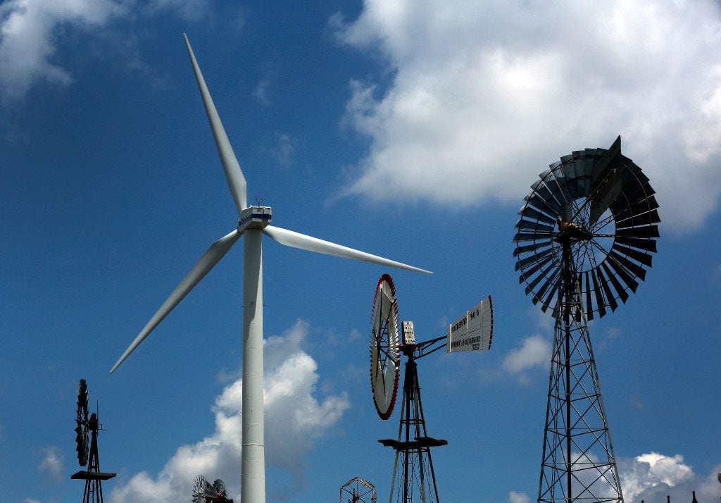 A large wind turbine is part of a collection of windmills at the American Wind Power Center...