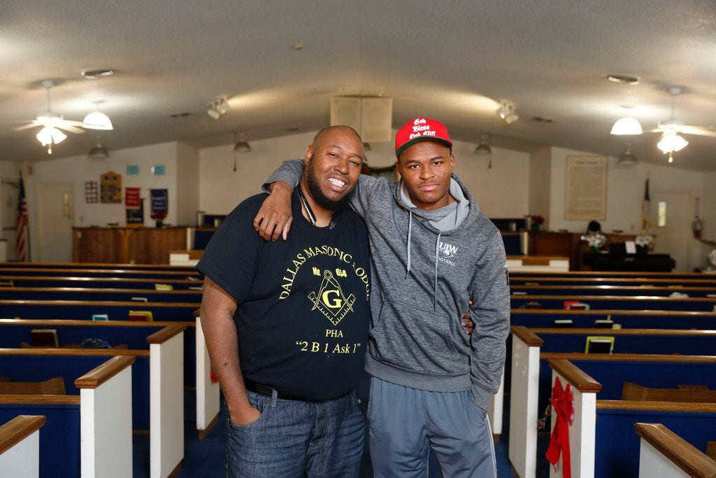 Maxie Johnson, left, with his son, David, 19, pose for a portrait at Paradise Missionary...