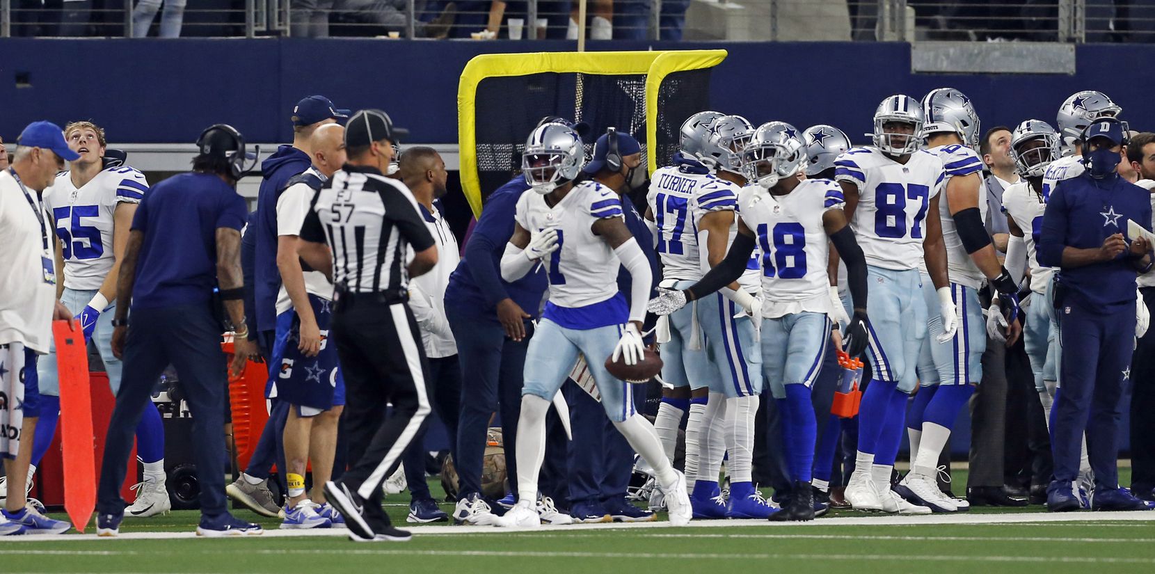 Dallas Cowboys cornerback Trevon Diggs (7) beats his chest, as he returns to the bench,...
