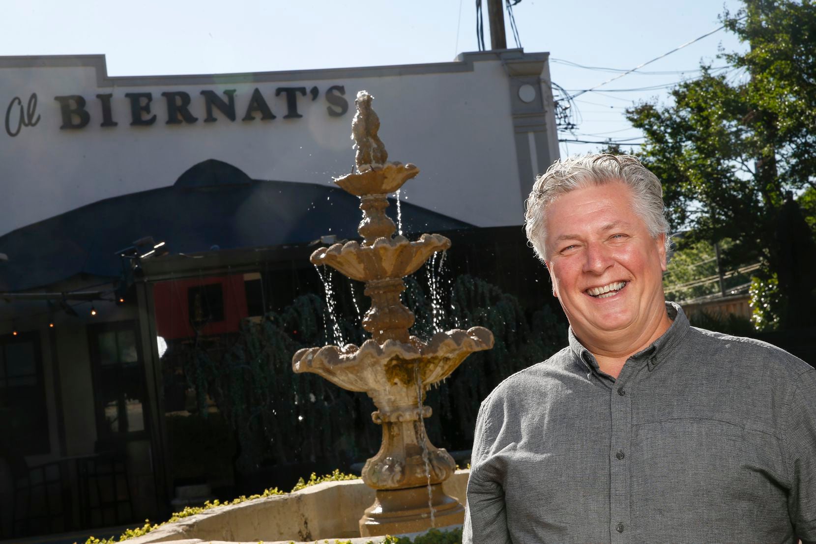 Al Biernat poses for a photograph outside the Highland Park location of his steakhouse, Al...